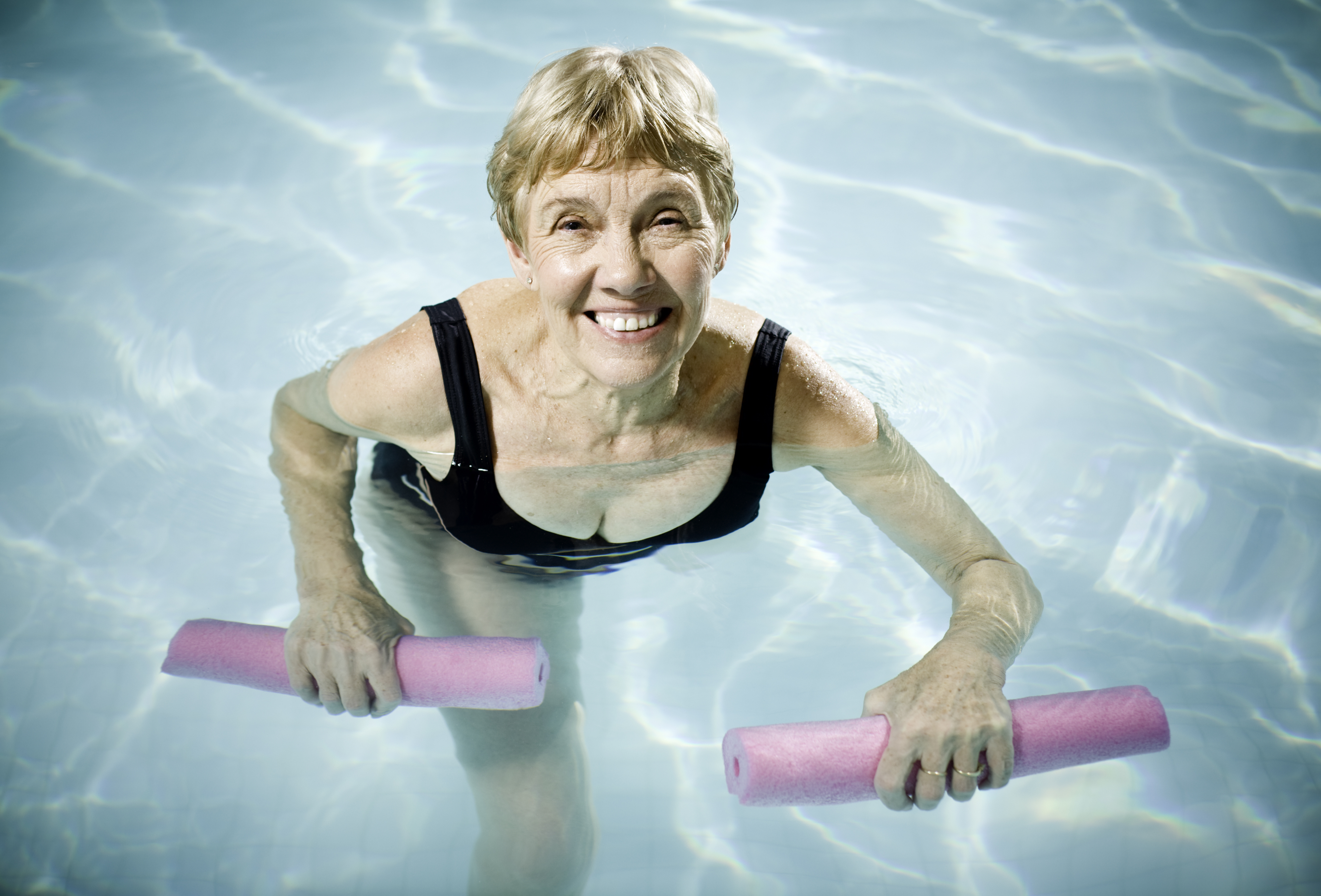 Active Senior Woman Aquasizing